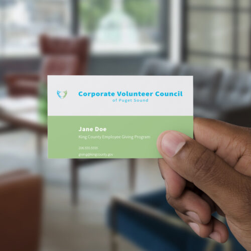 NS-Design-Corporate-Volunteer-Council-Business-Card-in-Hand