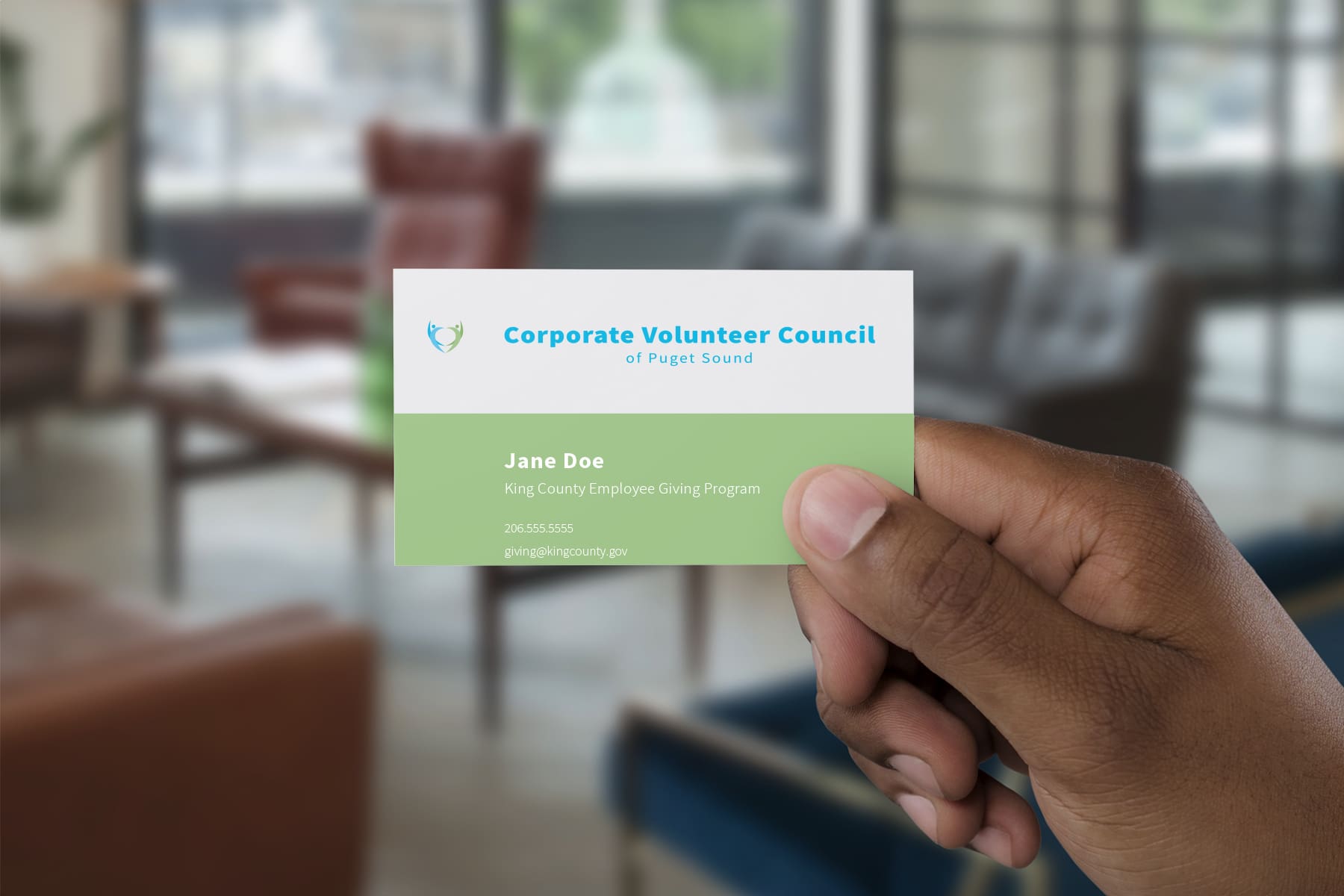 NS-Design-Corporate-Volunteer-Council-Business-Card-in-Hand NS-Design-Corporate-Volunteer-Council-Business-Card-in-Hand