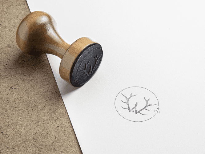 Woolen-Antler-Brand-Stamp-Mock-Up Custom-W-Logo-Featured-As-Stamp-on-Paper-Nadia-Soucek-Design